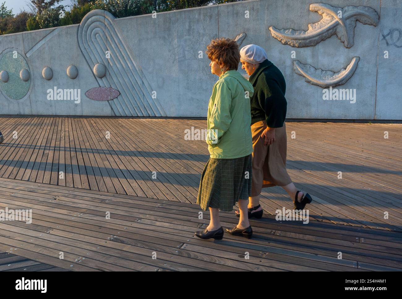 Retired women walking boardwalk hi-res stock photography and images - Alamy