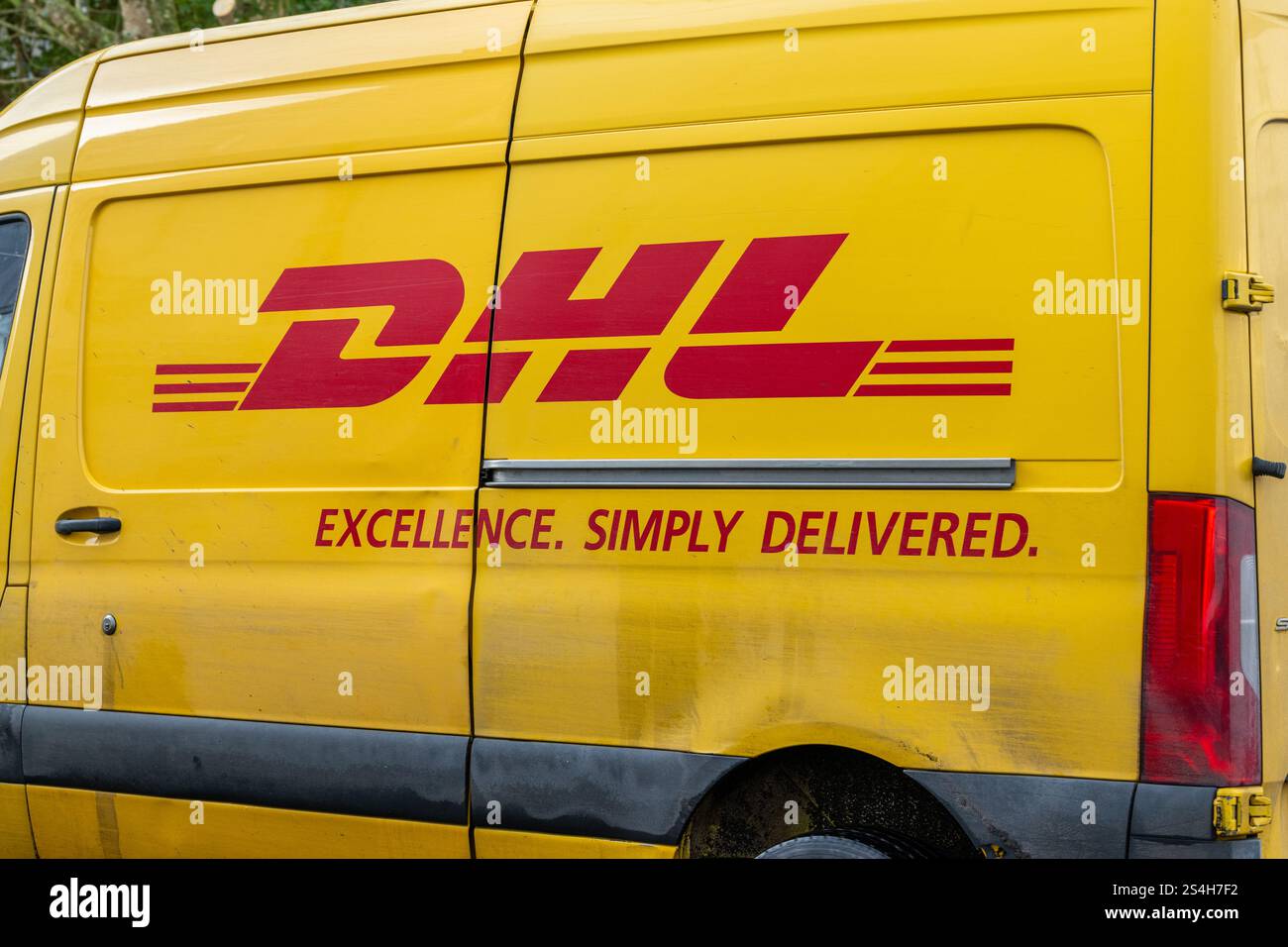 DHL van making deliveries in Clonakilty, West Cork, Ireland. Stock Photo