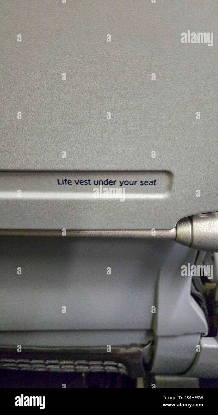 Fasten seat belt sign on an airplane flight Stock Photo - Alamy