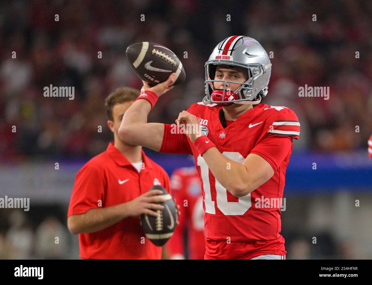 January 10 2025 Ohio State Buckeyes quarterback Julian Sayin (10) warms up on the sideline