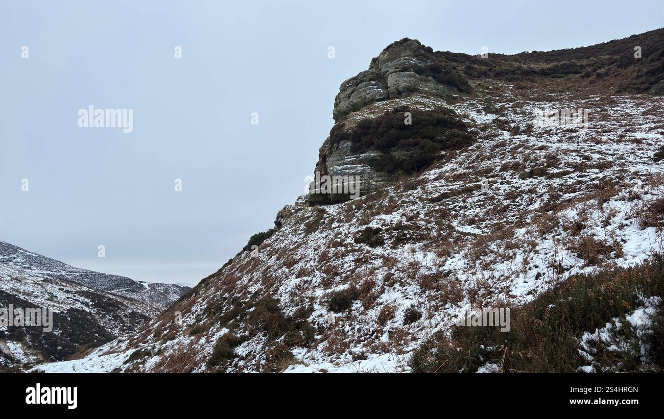 John Knox's Pulpit cliff face in Glen Vale in the heart of Scotland between East and West Lomond hills. Ice and snow in winter - Smartphone Captured Stock Image