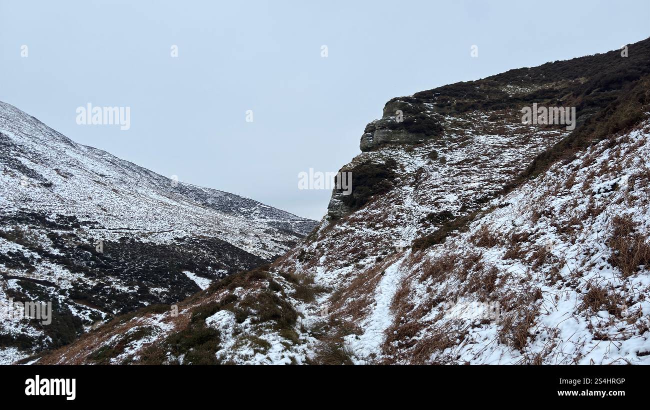 John Knox's Pulpit cliff face in Glen Vale in the heart of Scotland between East and West Lomond hills. Ice and snow in winter - Smartphone Captured Stock Image