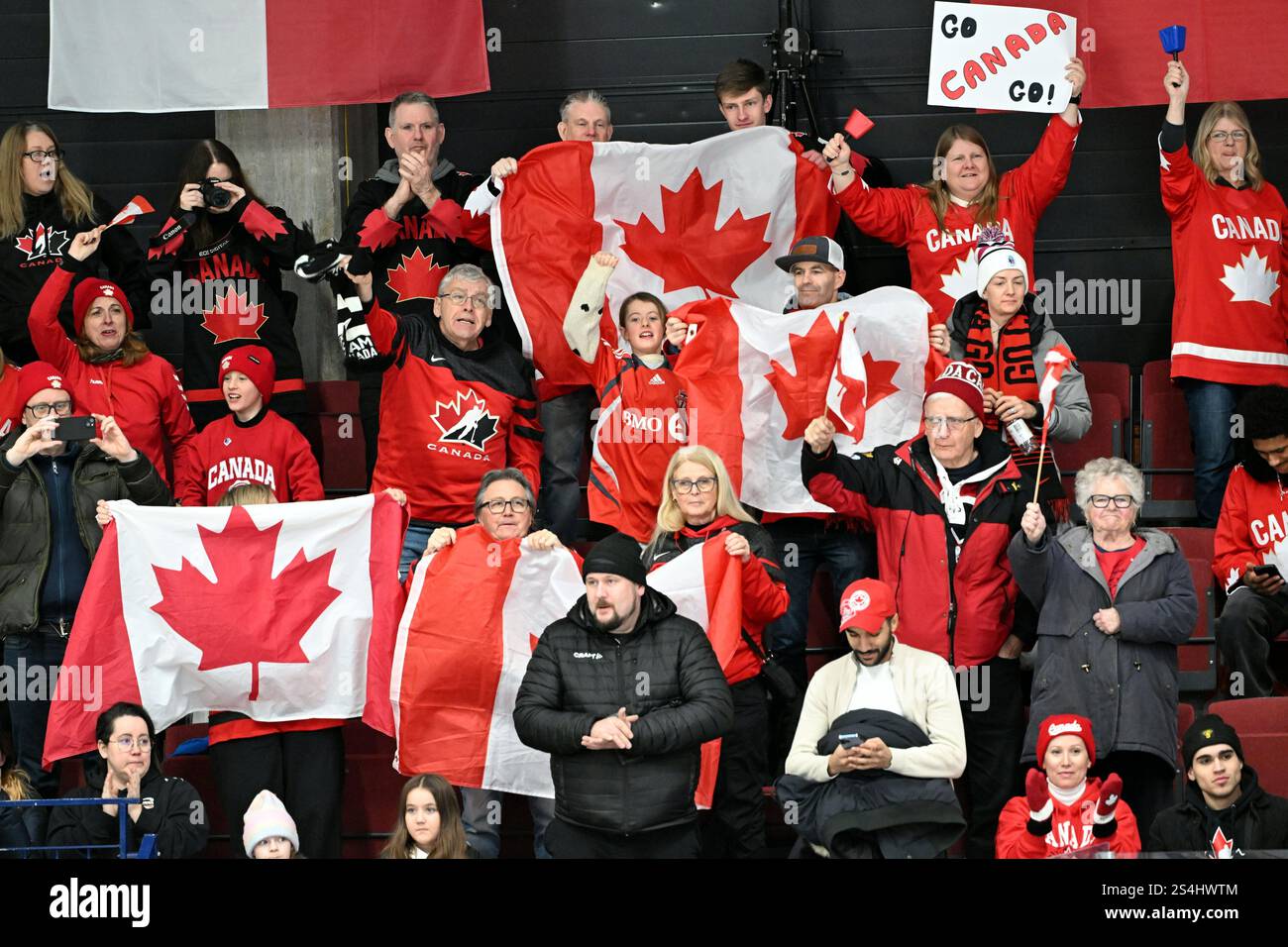 Supporters of Canada cheer during the 2025 IIHF U18 Women's World
