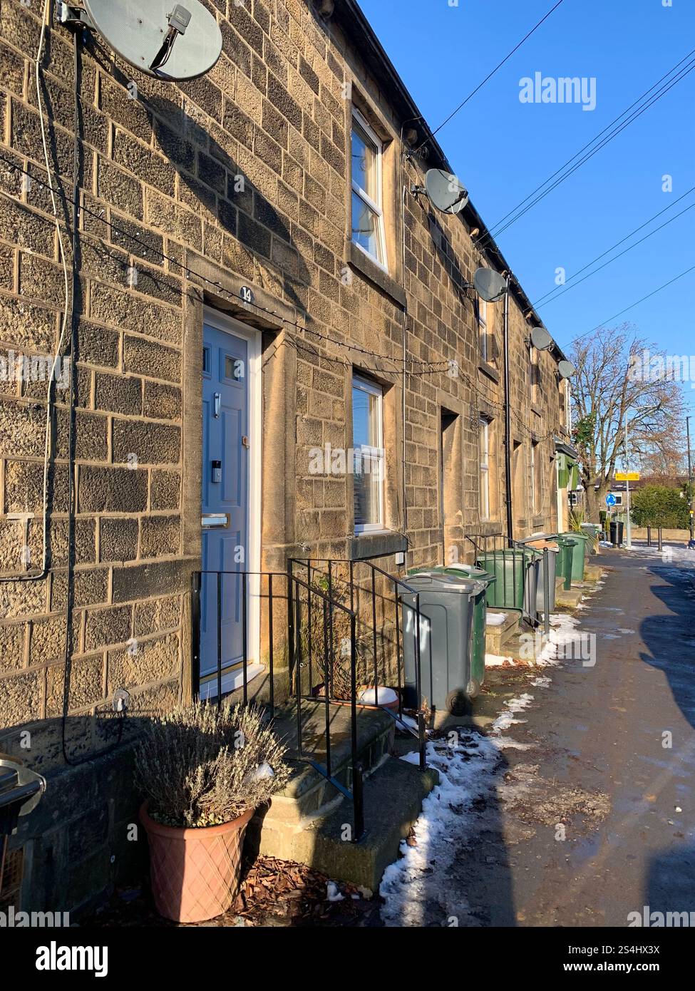 Burley in Wharfedale UK Yorkshire England Village Town people Winter Autumn Spring cold weather ice snow stone houses old Victorian design gardens - Smartphone Captured Stock Image