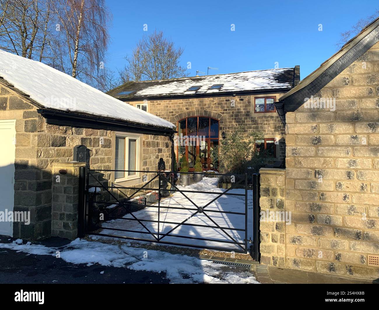 Burley in Wharfedale UK Yorkshire England Village Town people Winter Autumn Spring cold weather ice snow stone houses old Victorian design gardens - Smartphone Captured Stock Image