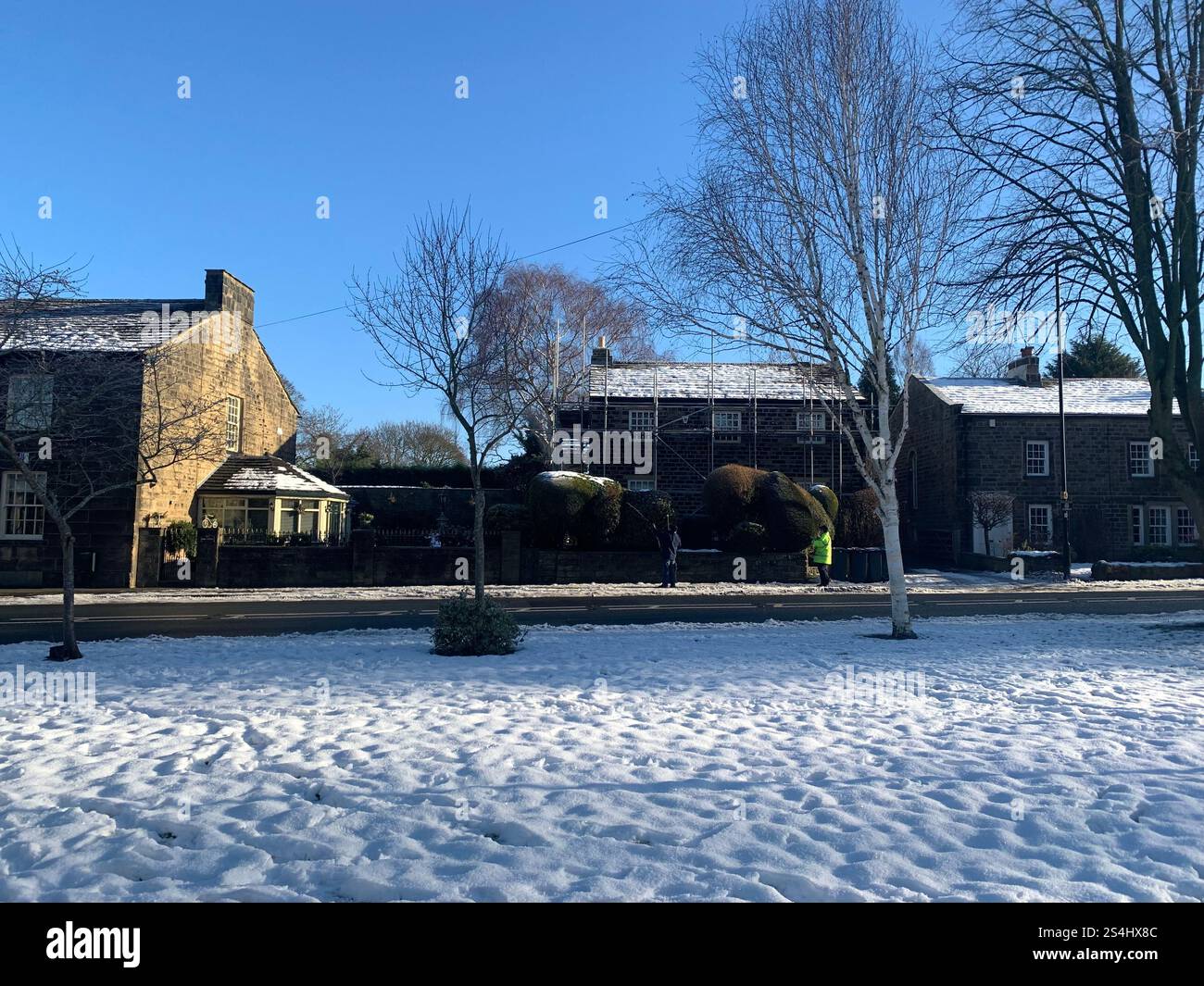 Burley in Wharfedale UK Yorkshire England Village Town people Winter Autumn Spring cold weather ice snow stone houses old Victorian design gardens - Smartphone Captured Stock Image