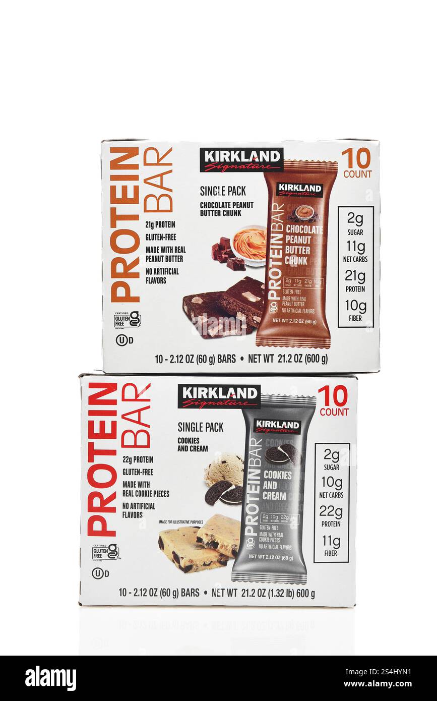 IRVINE, CALIFORNIA - 11 JAN 2025: Two boxes of Kirkland Protein Bars, Chocolate Peanut Butter Chunk and Cookies and Cream flavors. Stock Photo