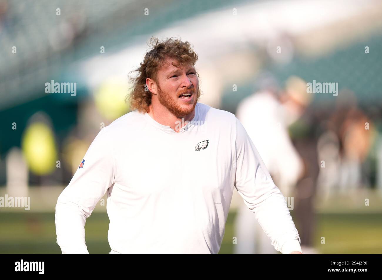 Philadelphia Eagles center Cam Jurgens warms up before an NFL wildcard