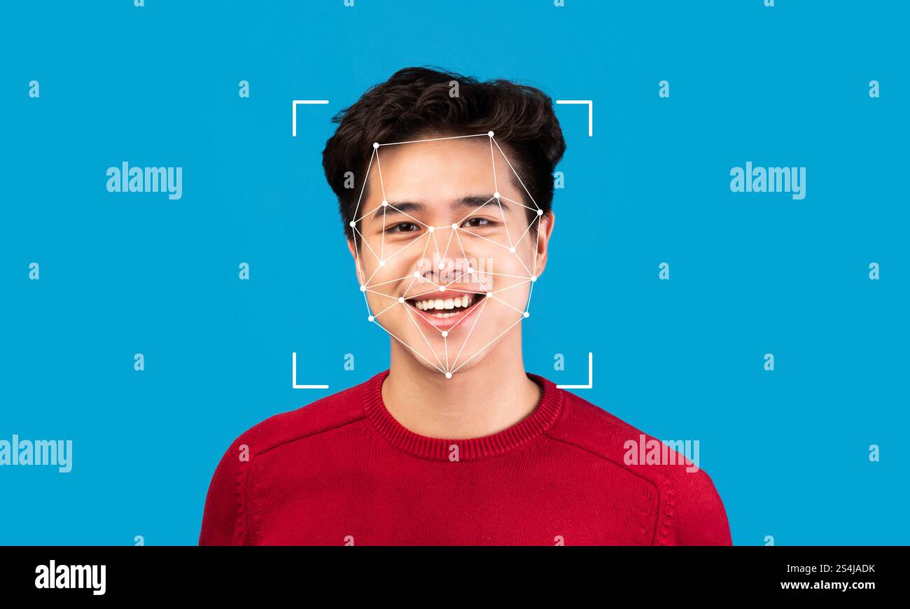 Facial recognition technology enhances identification with smiling subject Stock Photo