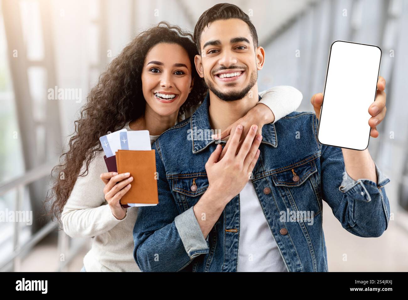 Best Booking App. Arab Couple Holding Passports With Tickets And Blank ...