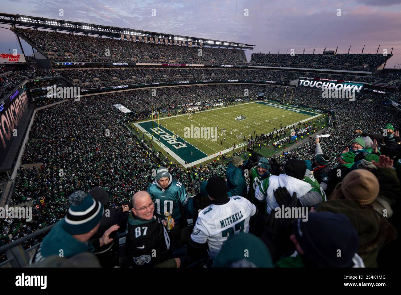Philadelphia Eagle fans celebrate the touchdown during an NFL wildcard