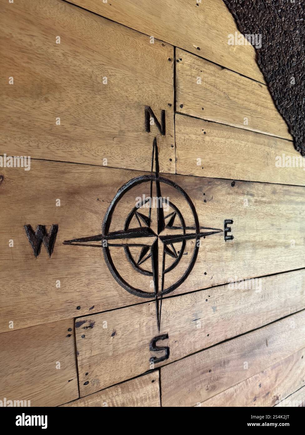 Elegant Burn Wooden Compass Rose Design Stock Photo