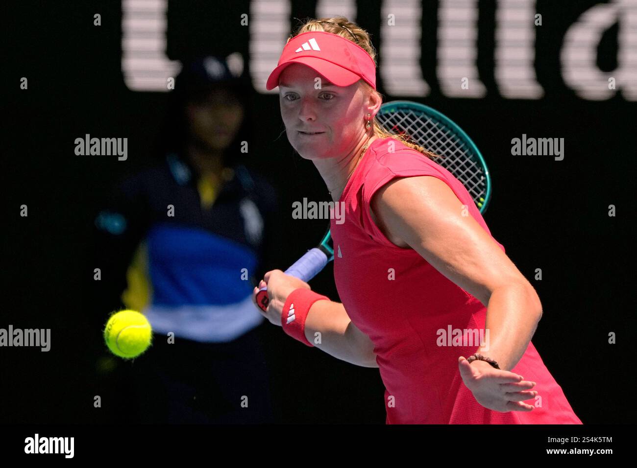 Ashlyn Krueger of the U.S. plays a forehand return to Ajla Tomljanovic