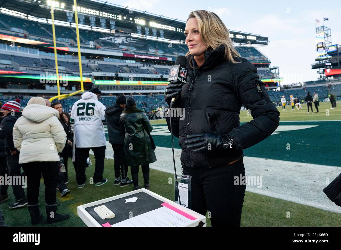 NFL Network reporter Stacey Dales looks on before an NFL wildcard