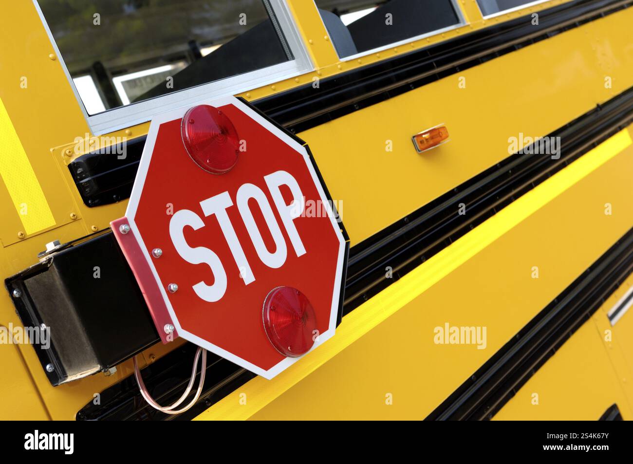 Closeup of a stop sign on a school bus Stock Photo - Alamy