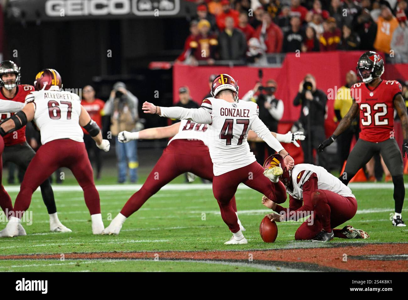 Washington Commanders place kicker Zane Gonzalez (47) kicks a field