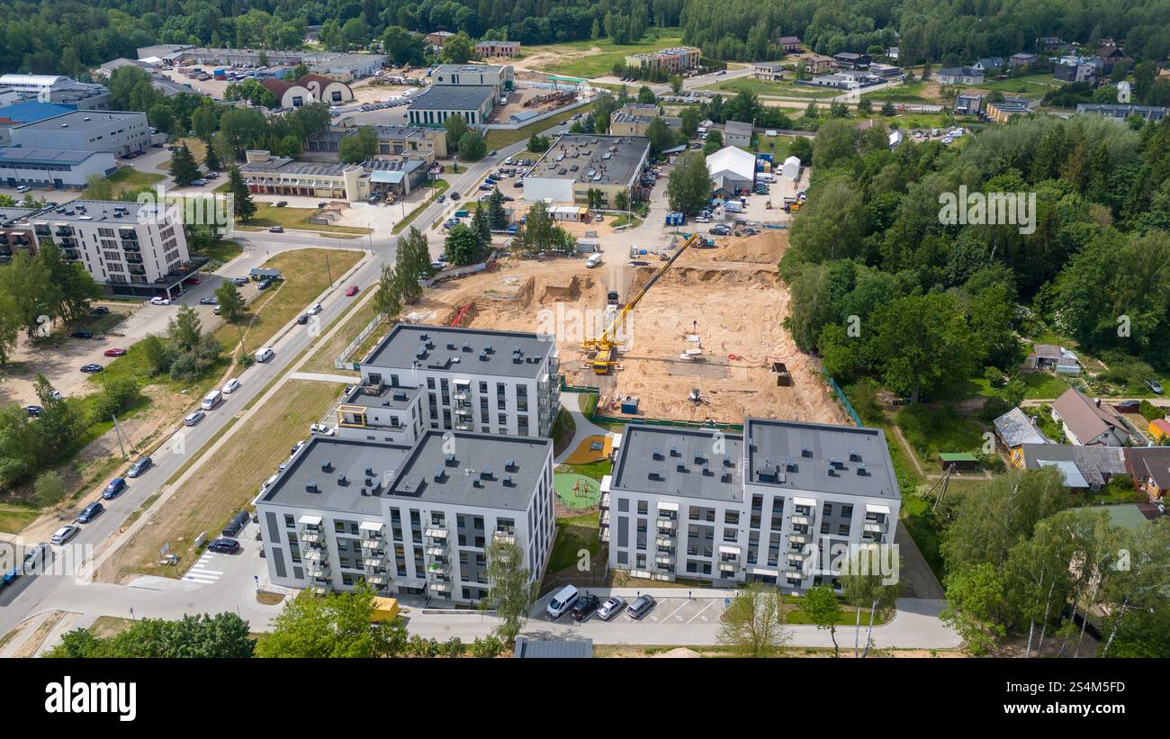 Aerial view of a construction site in a residential area with modern ...