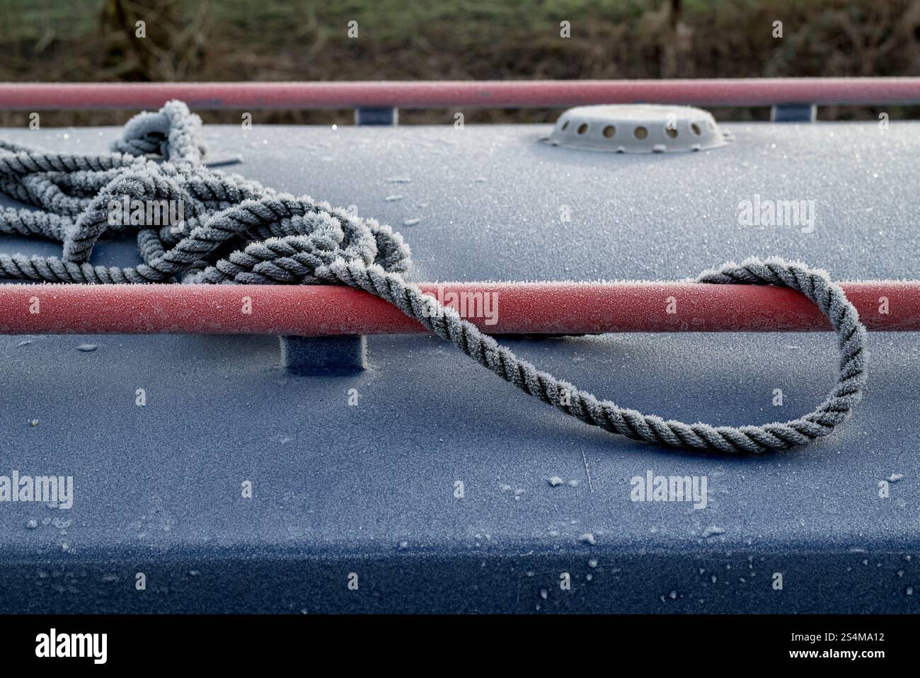 Frosted narrowboat rope close up. Oxfordshire, England Stock Photo