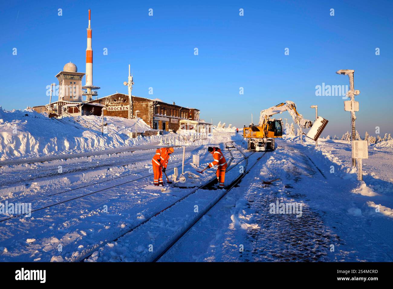 Railroad workers clear the tracks from snow on northern Germany's 1,142 ...
