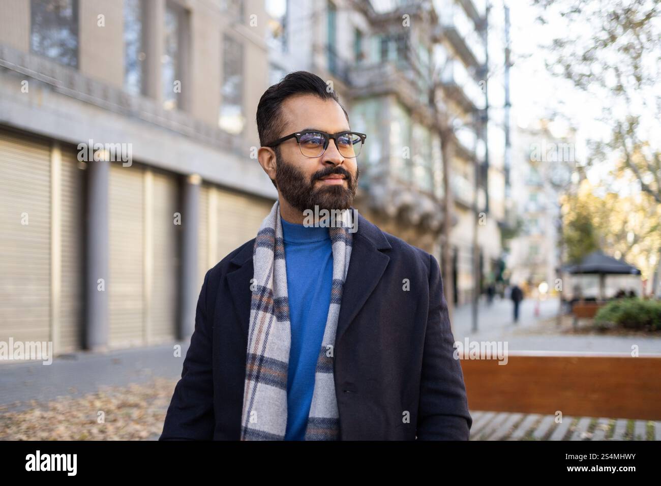 Indian man standing confidently hi-res stock photography and images - Alamy