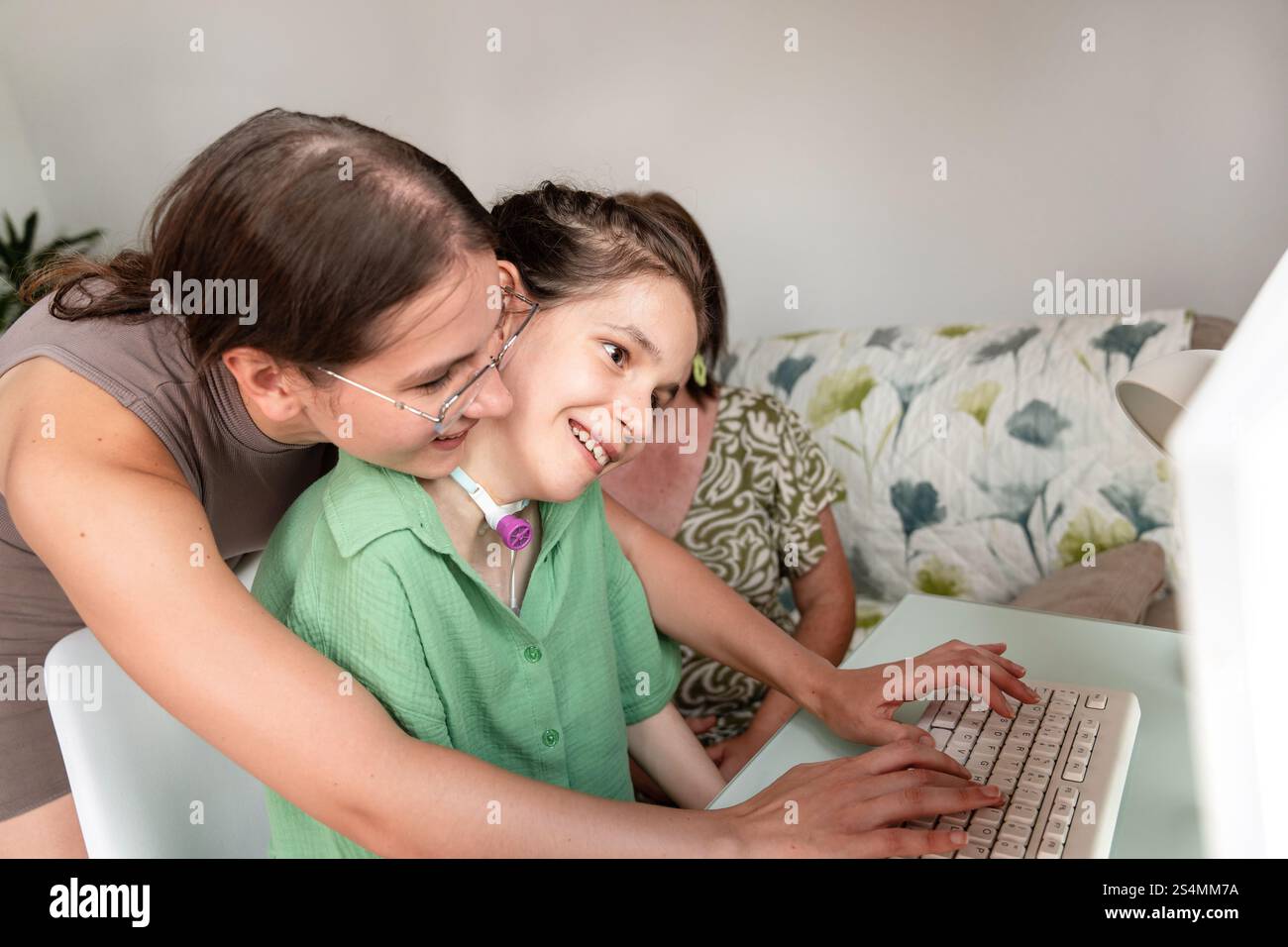 A loving family spends quality time with their disabled daughter, who ...