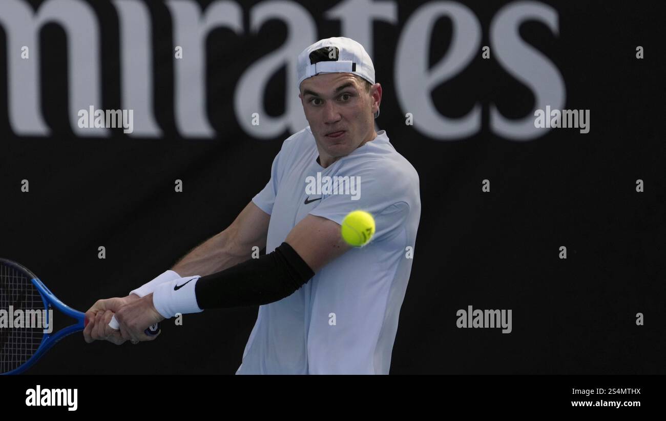 Jack Draper of Britain plays a backhand return to Mariano Navone of