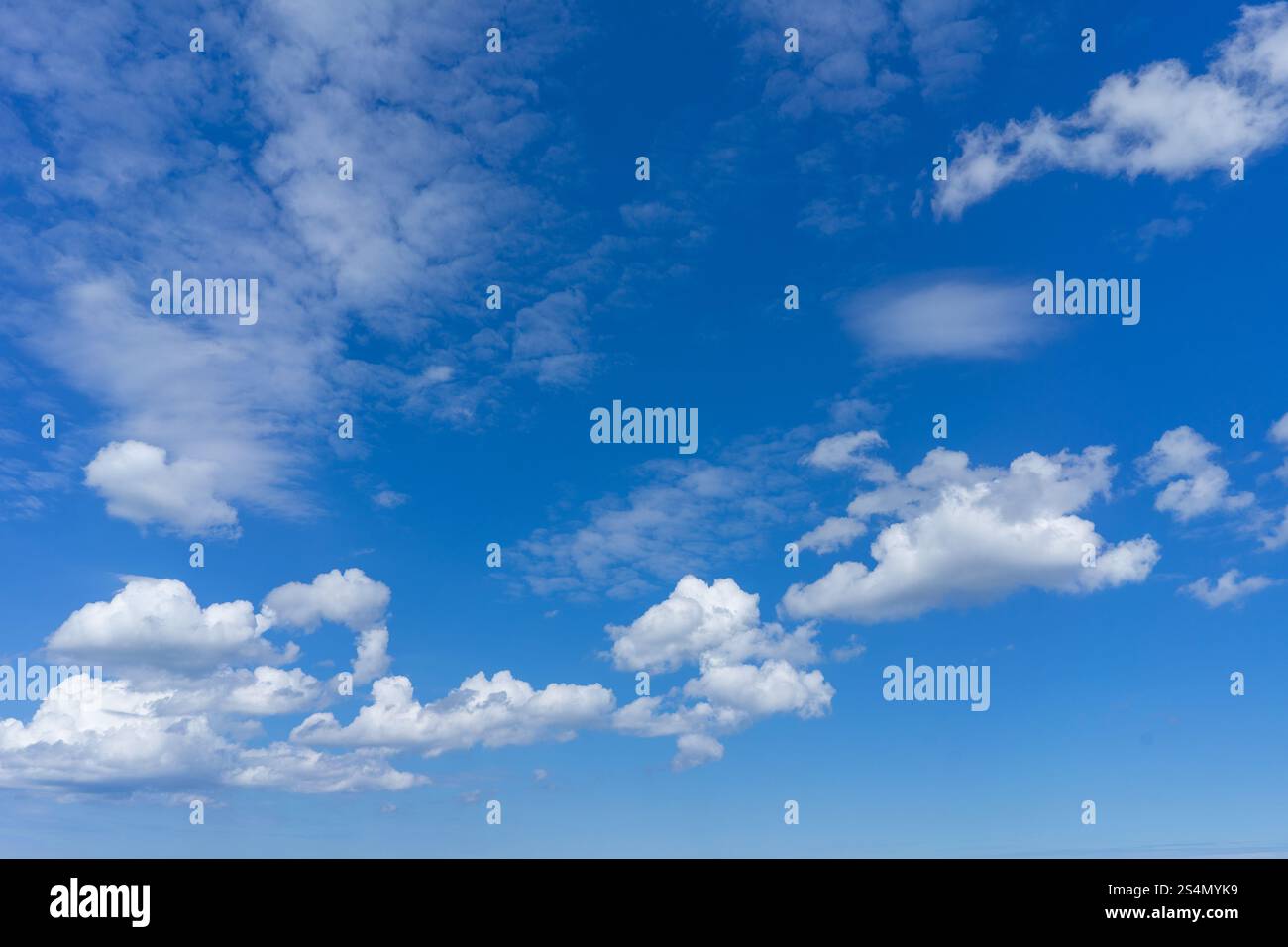 blue sky with cumulus clouds texture background Stock Photo