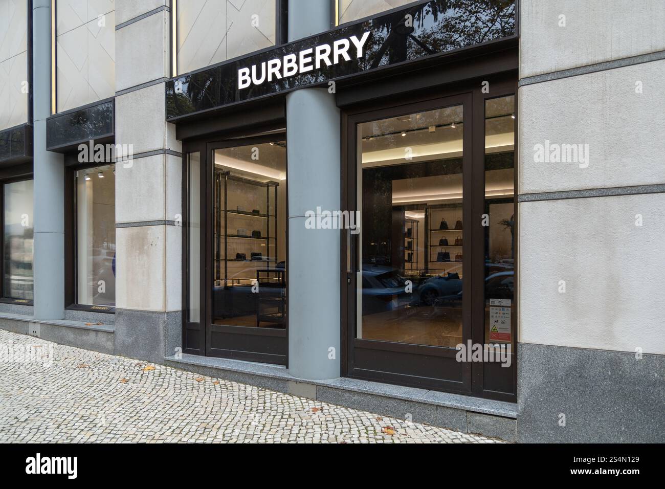 Lisbon, Portugal. 8 December 2023. Exterior view of Burberry store in Lisbon. Burberry is a British luxury fashion house headquartered in London, Engl Stock Photo