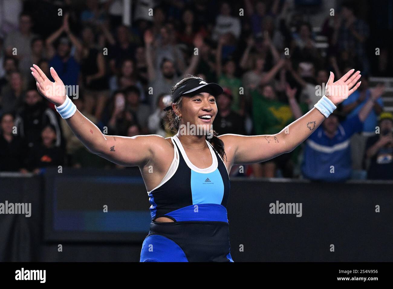 Destanee Aiava of Australia celebrates after winning her round 1 match
