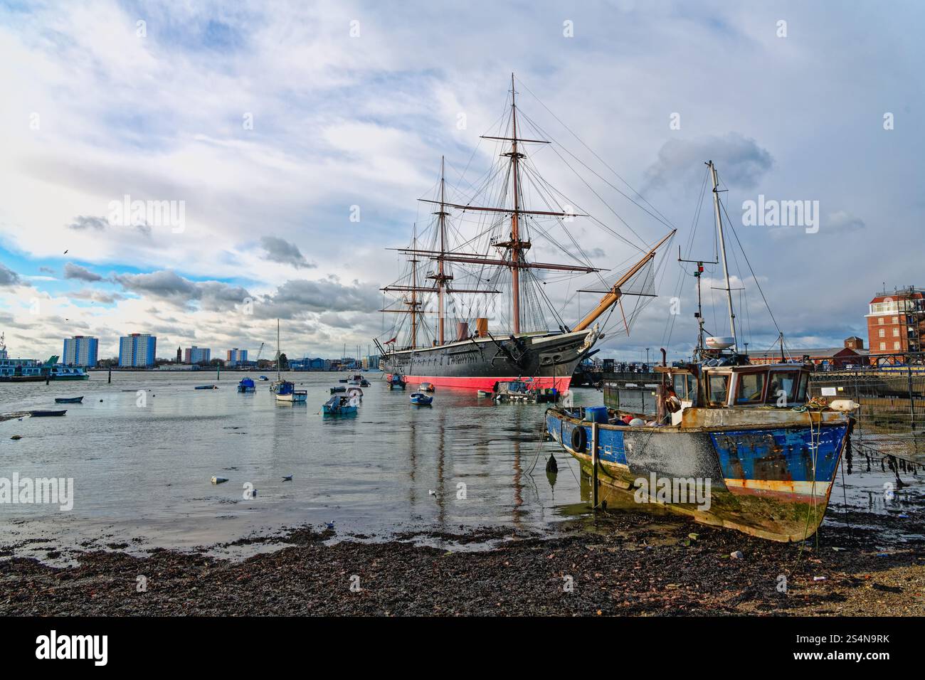 H.M.S. Warrior, first Royal Naval iron hulled armoured battleship moored at Portsmouth's Historic Dockyard Hampshire England UK Stock Photo