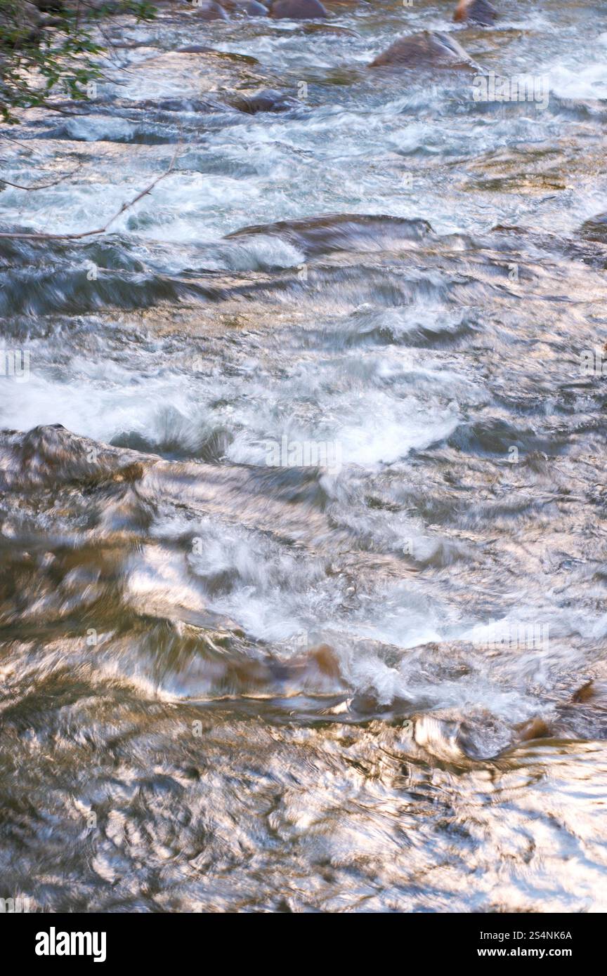 mountain river with rapid current (background) Stock Photo