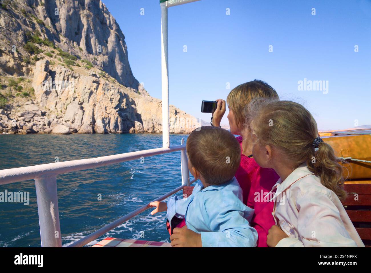 family on marine walk on excursion ship along with the coast Stock ...