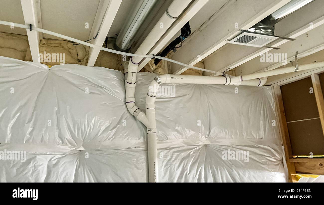 Exposed Metal Beam in Basement Construction Stock Photo - Alamy