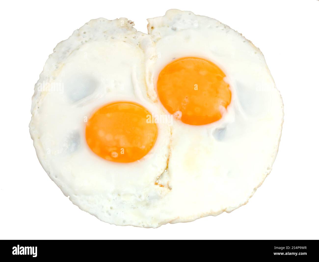 top view of two fried eggs isolated on white background Stock Photo - Alamy