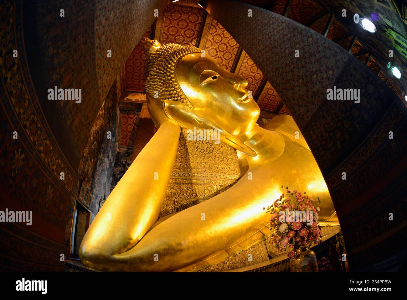 the reclining buddha in the temple of Wat Pho in the city of Bangkok in ...