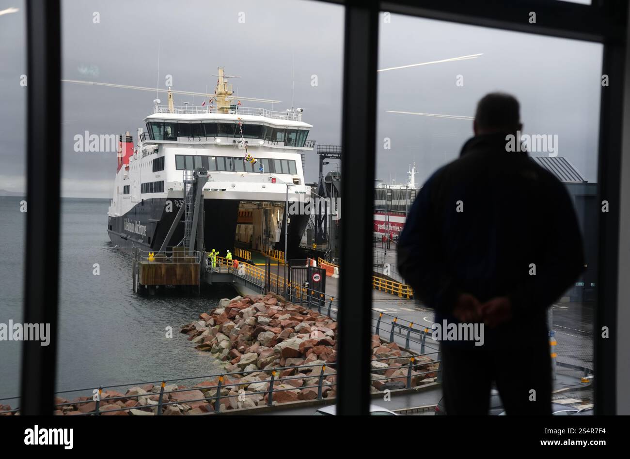 Passengers wait to board The Glen Sannox ferry in Brodick on Isle of