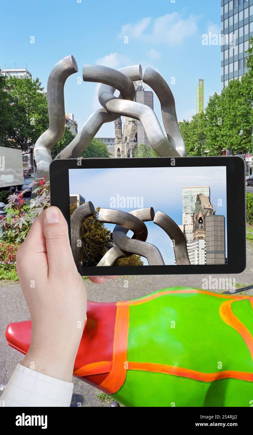 travel concept - tourist taking photo of Berlin symbols in ...