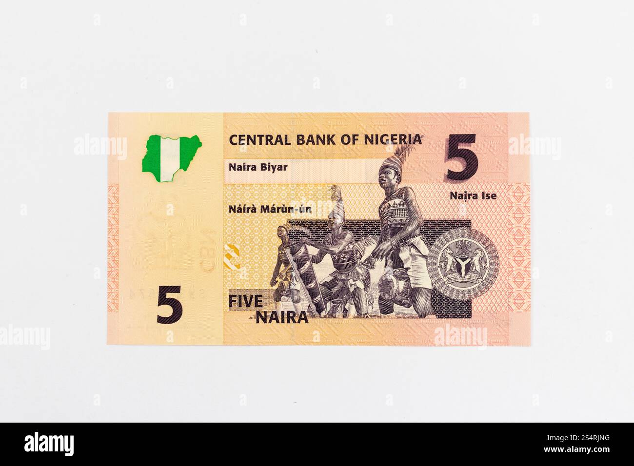 Nigeria five naira banknote reverse side of the note is a depiction of three traditional Yoruba drummers Stock Photo