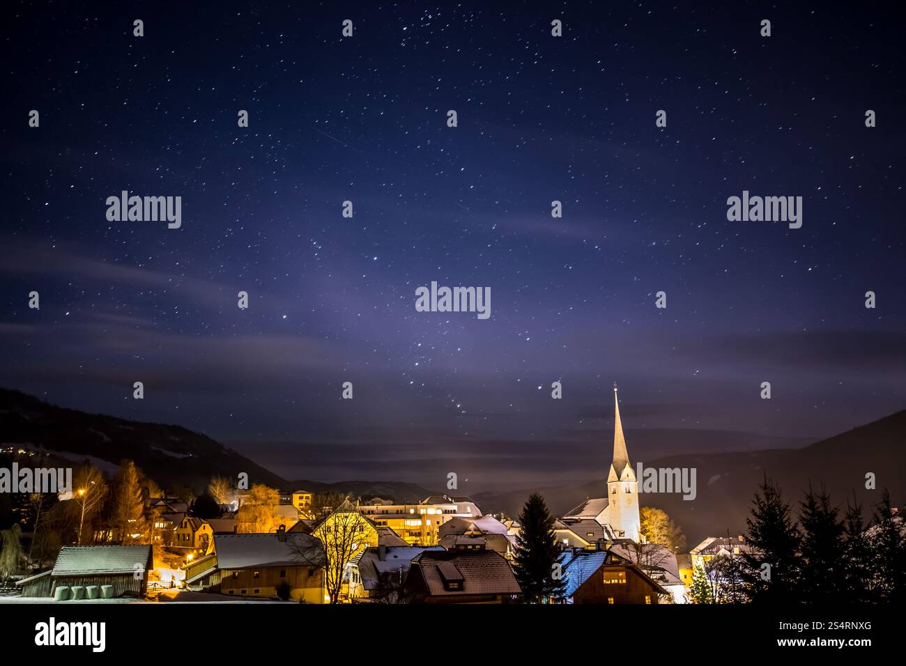 Beautiful view of clean night starry sky over highland Austrian town Stock Photo