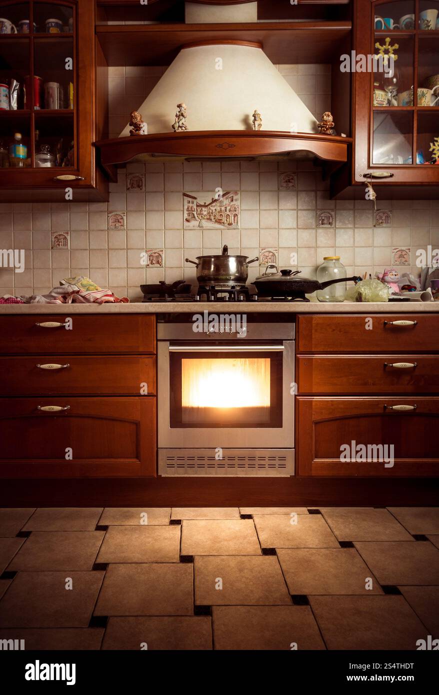 Interior photo of country style kitchen with hot oven Stock Photo - Alamy