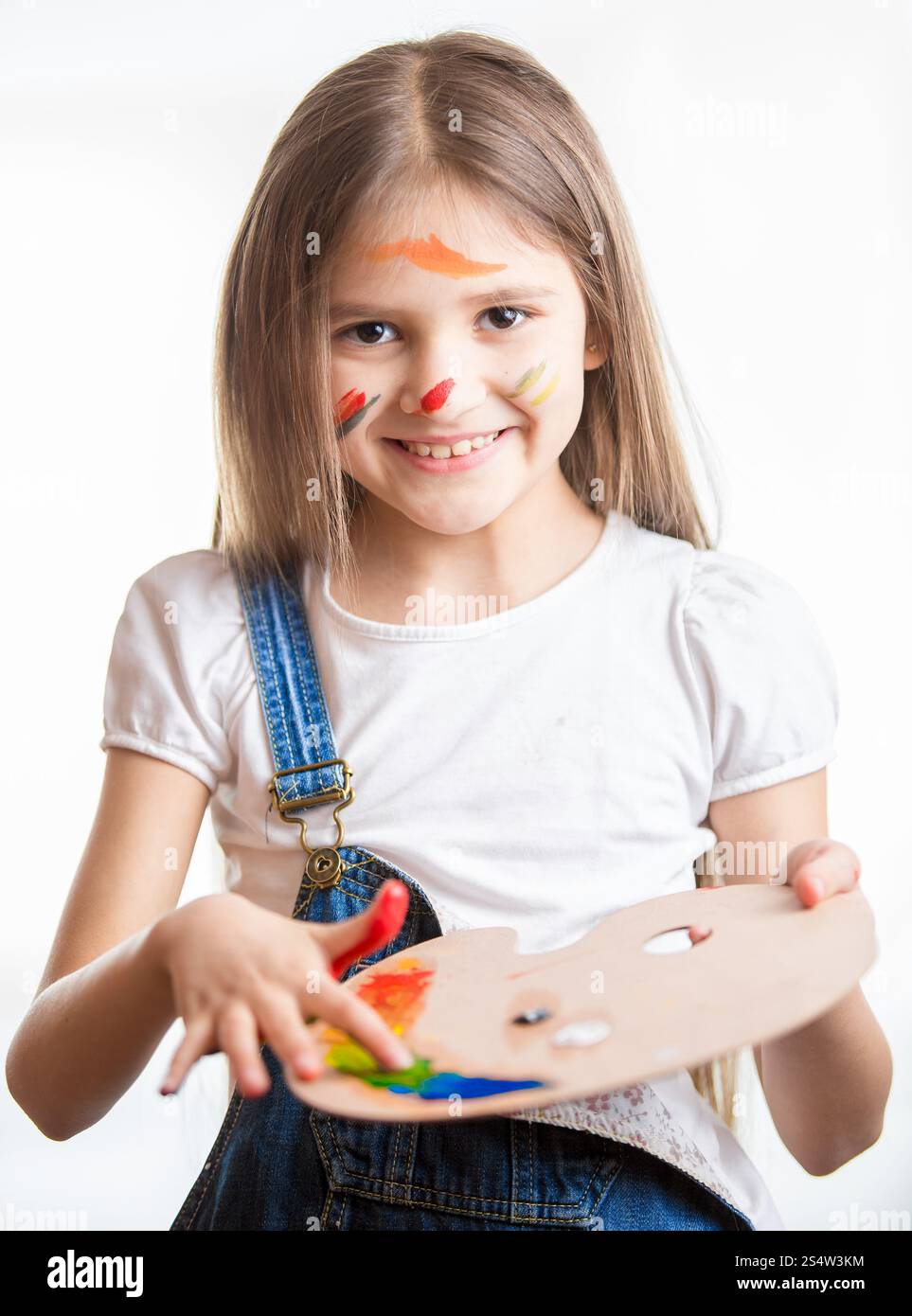 Closeup portrait of smiling little girl with painted face by different ...