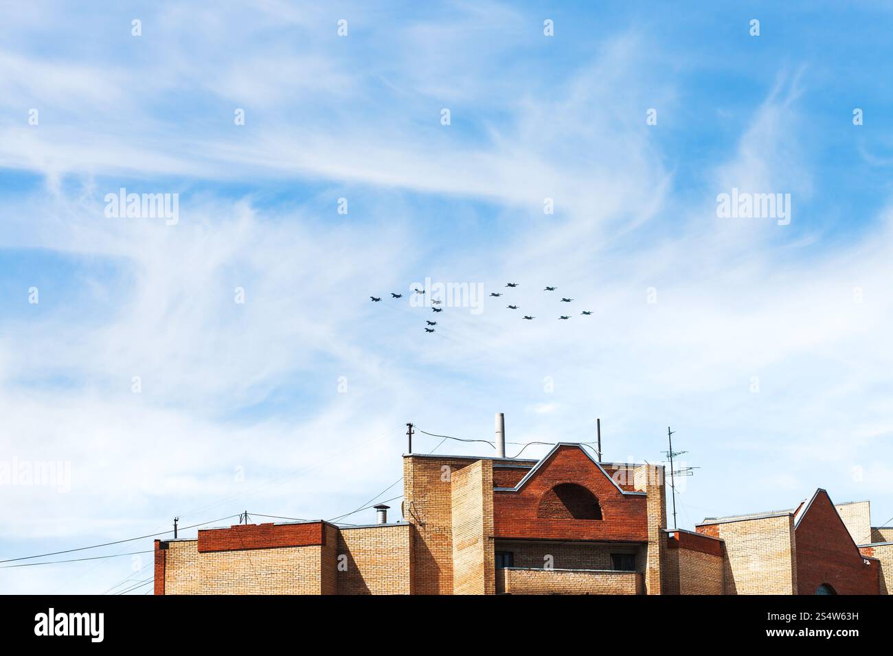 military fighters MiG-29 and attack aircrafts Su-25 during traditional parade to mark the 70th anniversary of Victory in Great Patriotic War over Stock Photo