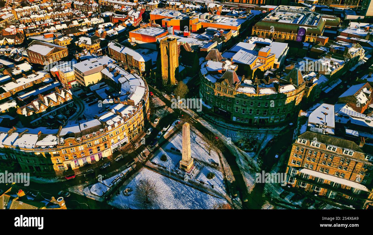 Photo inspiration: Gallery Detail: Aerial View Of A Snow Dusted Town Center Featuring A