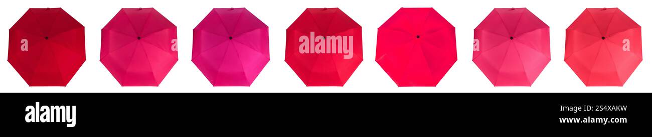 Set of different red colors umbrellas isolated on white background. Top view. Stock Photo