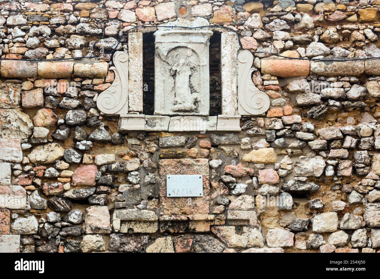 Details on stony wall of lighthouse (near Nazare, Portugal). Stock Photo