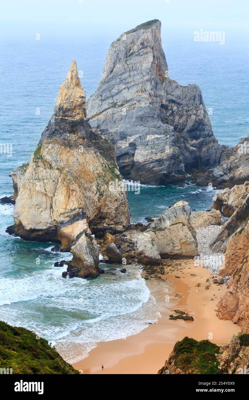 Atlantic ocean coast (granite boulders and sea cliffs) in cloudy ...