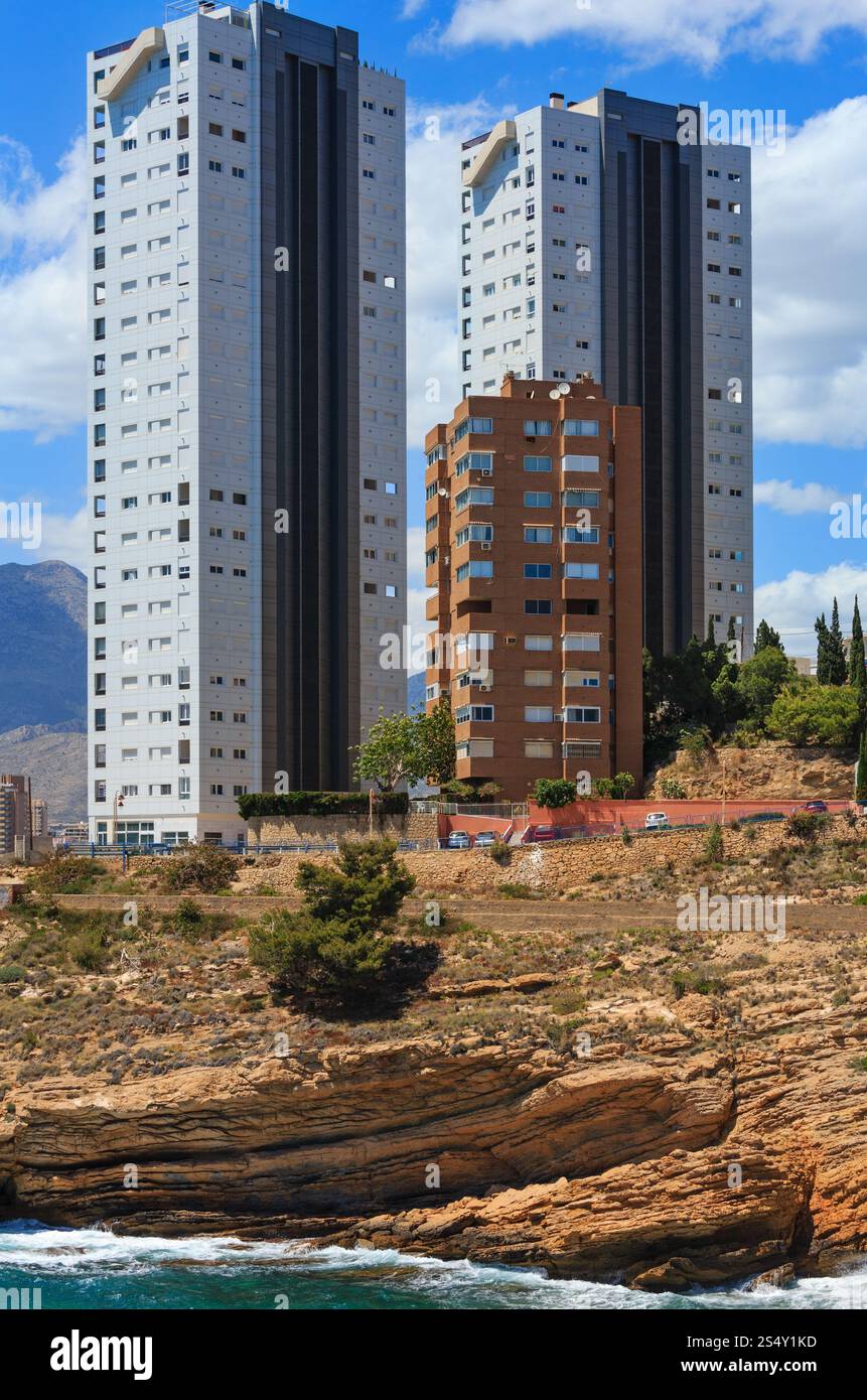 Skyscrapers on rocky coast. Benidorm city coastline summer view (Costa Blanca, Alicante, Spain). Stock Photo