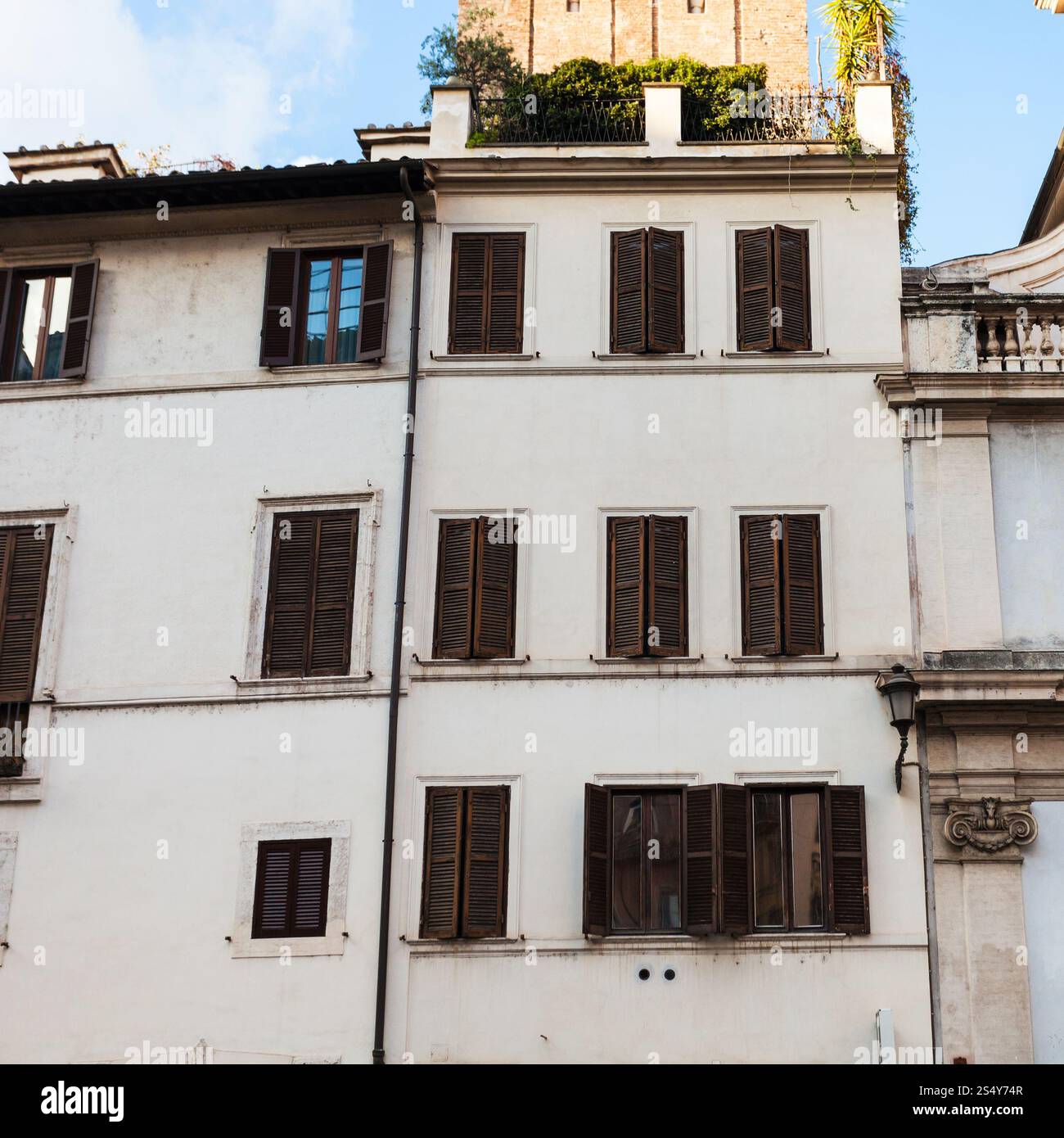 travel to Italy - white facades of urban houses in medieval district of ...