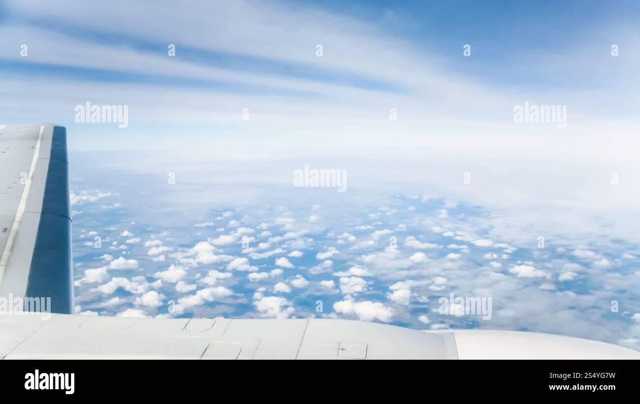 Airplane wing many clouds hi-res stock photography and images - Alamy