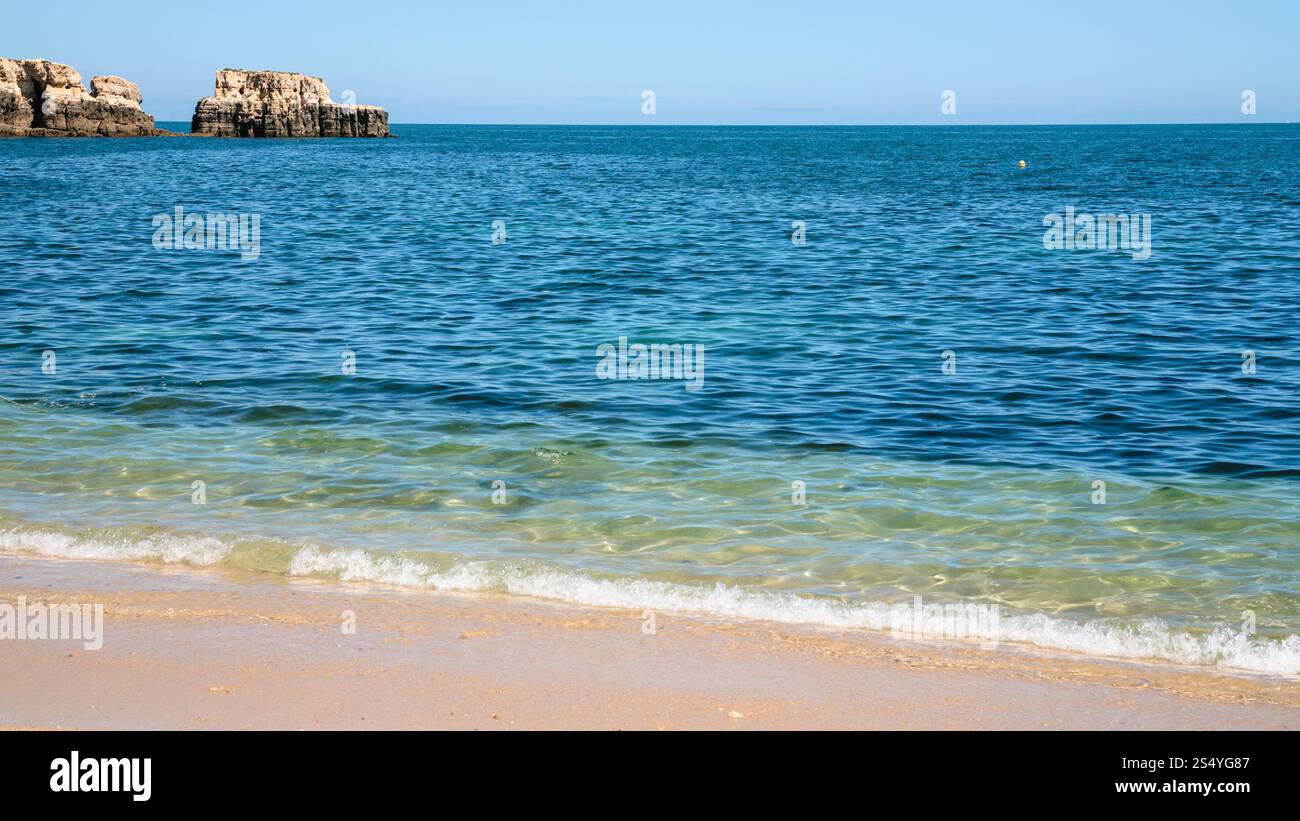 Travel to Algarve Portugal - beach Praia Maria Luisa near Albufeira city in sunny day Stock Photo
